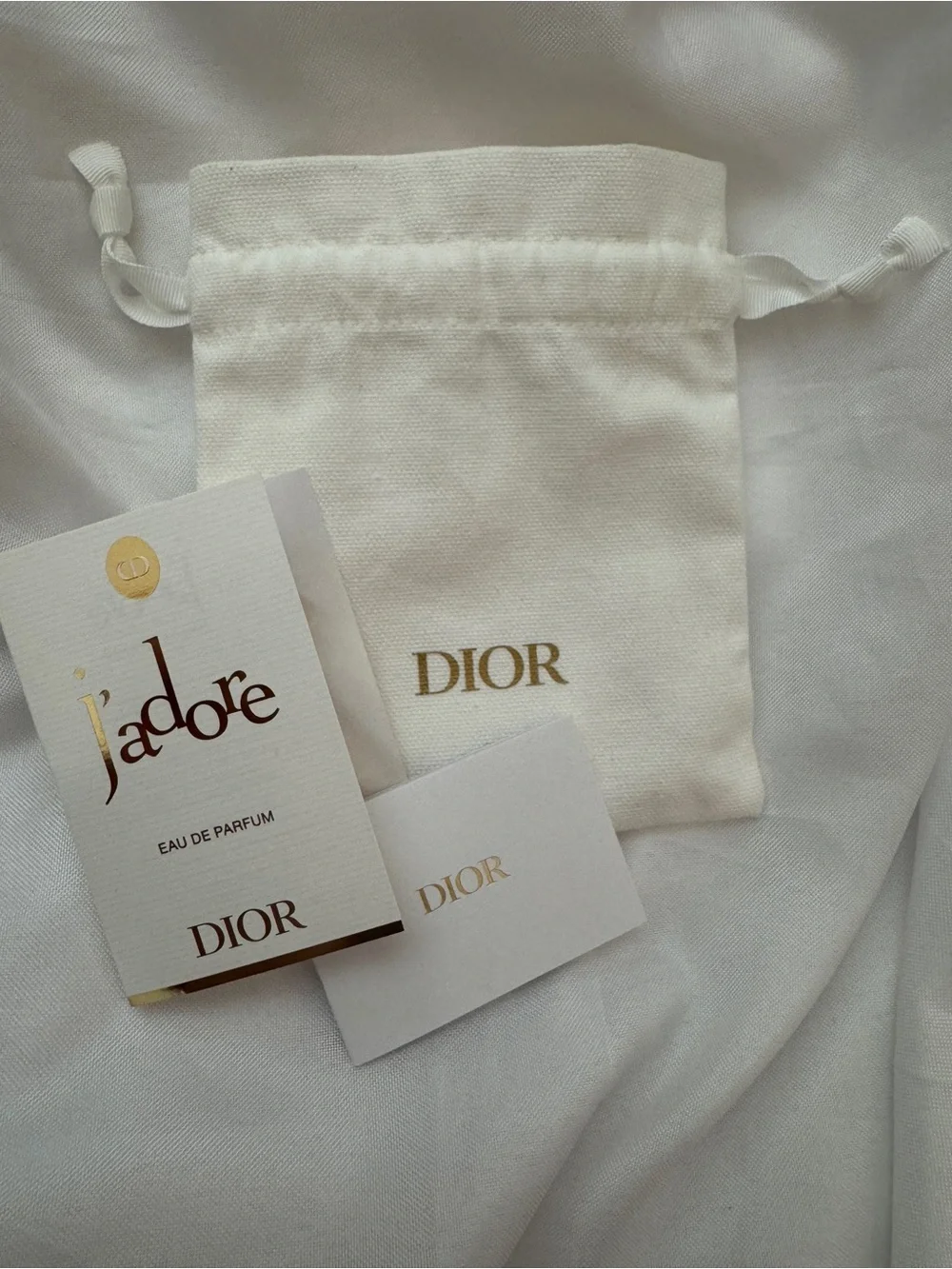Dior White Drawstring Cosmetic Pouch with Gold Logo